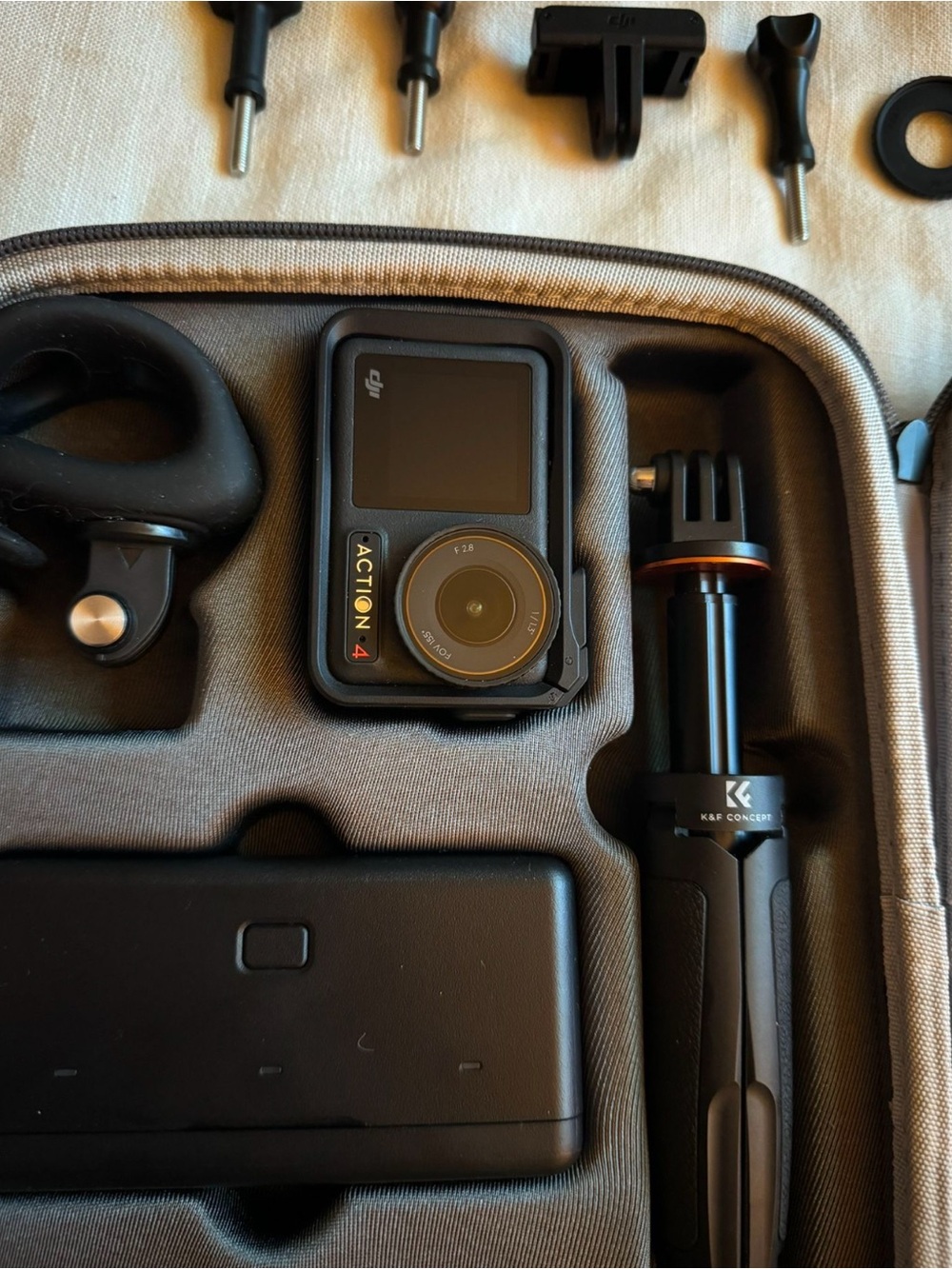 DJI Action 4 Camera with Black and Gray Accessories
